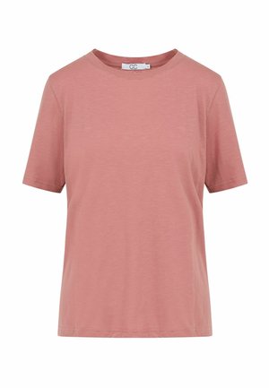 Camiseta de algodón de manga corta en rosa polvo sólido, con cuello redondo y una pequeña etiqueta blanca de la marca en el interior del cuello.