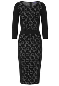Schwarzes, tailliertes Kleid mit Dreiviertelärmeln; gemusterter Oberteil mit weißen abstrakten Linien; glatte Textur, knielange Länge.