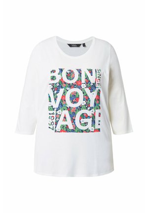 Weißes Langarmshirt mit Rundhalsausschnitt und farbenfrohem Blumenprint mit dem Text "Bon Voyage" auf der Vorderseite.