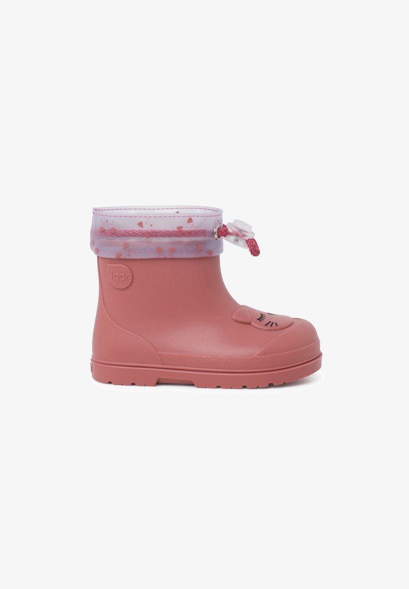 Stivale da pioggia in gomma rosa con punta rotonda, dettaglio con faccia sorridente e bordo trasparente a motivo. Regolatore alla sommità per stringere.
