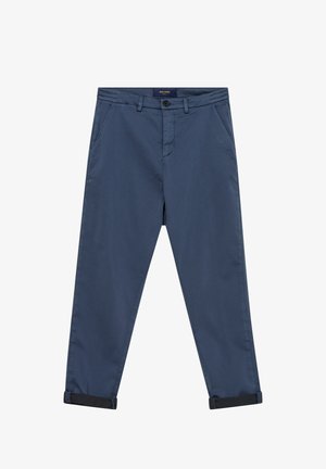 Herre marineblå, tilspidsede bukser med sidelommer, bæltestropper, knaplukning og opkørte manschetter.