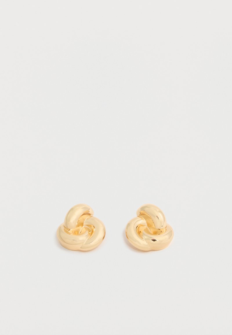Pair of shiny gold-tone knot-shaped stud earrings on a plain white background.