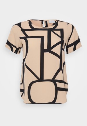 Beige korte mouw top met opvallende zwarte geometrische patronen. Ronde halslijn met een ritssluiting op de rug. Vergelijkbare, gladde stof.