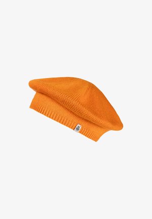 Orange knitted beret with ribbed band and small fabric tag on side, shown against white background.