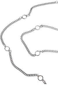 Silverfärgad metallkedja med cirkulära leder, som har flera små ringar längs sin längd och en slät, glänsande yta.