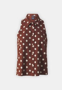 Camisa sin mangas marrón con lunares blancos, diseño abotonado y cuello. Hecha de tela ligera.