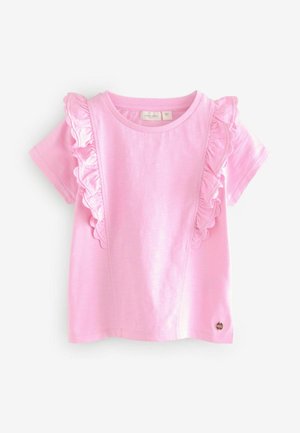 Rövid ujjú rózsaszín póló fodros díszítéssel a vállakon, puha anyagú, és kis logó részlet a szegélyén.