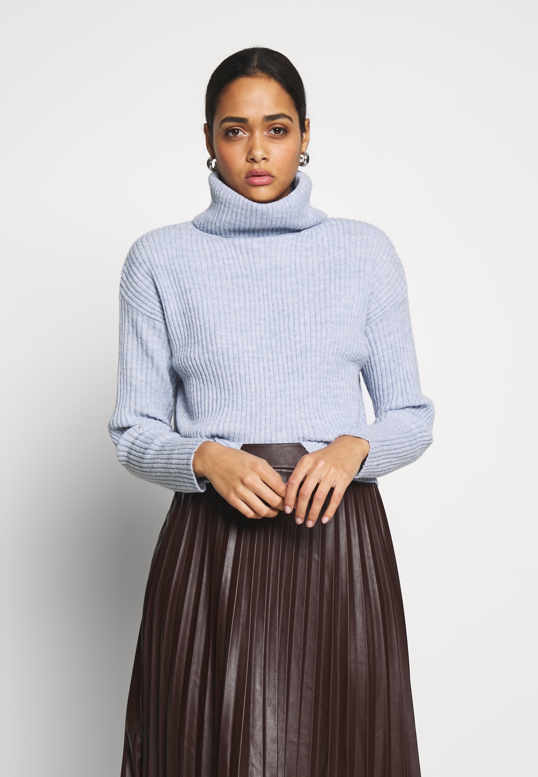 light blue polo neck