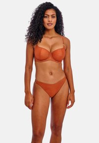 Orange bikini set featuring textured fabric, underwire bra with adjustable straps, and matching low-rise briefs with a side zipper detail.