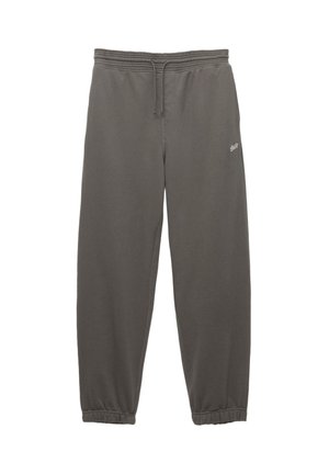 Graue Jogginghosen mit einem elastischen Bund und Kordelzug, versehen mit elastischen Bündchen an den Knöcheln und einem kleinen Logo an der Seite.