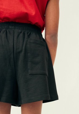 DRAWSTRING - Träningsbyxor - black