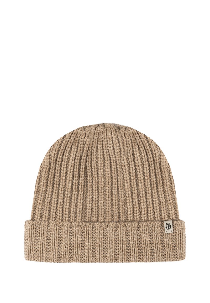 Beige ribbed knit winter beanie with folded cuff and small fabric tag on the side.