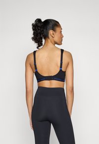 triaction by Triumph ENERGY LITE - Sports-BH-er med medium støtte - black