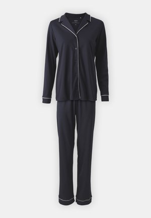 Navy blue pajama set made of soft fabric. Long-sleeve shirt with white piped edges, button front. Matching trousers with cuffed hems.