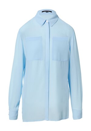 Chemise à manches longues bleu clair avec deux poches poitrine et un col. Fabriquée en tissu léger et doux.