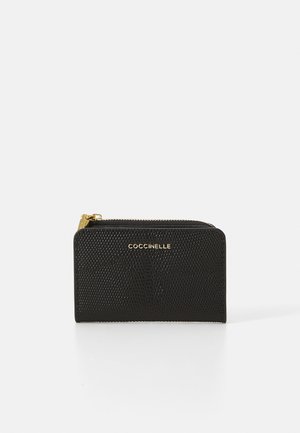 Black leather wallet with a textured finish, zip closure, and gold logo accent. Compact rectangular shape, suitable for cards and cash.