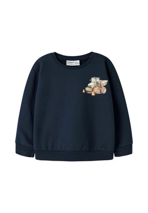 Sweat-shirt bleu marine pour enfant avec un petit graphique d’un camion-benne de chantier et deux cônes de signalisation orange sur la poitrine.