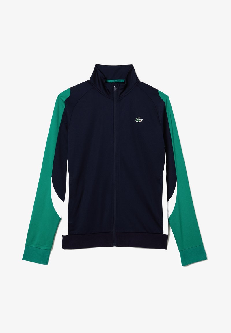 Marinejacke mit grün-weißen Akzenten, Front-Reißverschluss, Stehkragen und strukturiertem Stoff. Verfügt über ein gesticktes Logo auf der Brust.