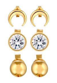 Boucles d'oreilles en ton doré présentant des formes de croissant et des clous ronds ornés de cristaux transparents étincelants. Des surfaces lisses et réfléchissantes mettent en valeur un design élégant.
