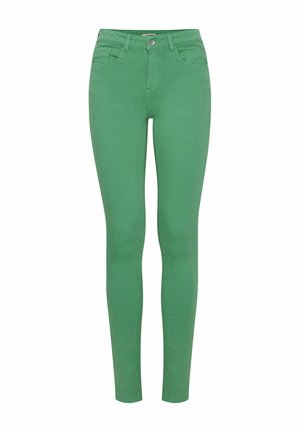 Jean skinny vert en coton stretch, avec une taille mi-haute, cinq poches et une fermeture boutonnée à l'avant.