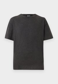 T-shirt noir oversize en tissu doux, avec des manches courtes, un col rond et des détails de logo en relief minimalistes à l'avant.