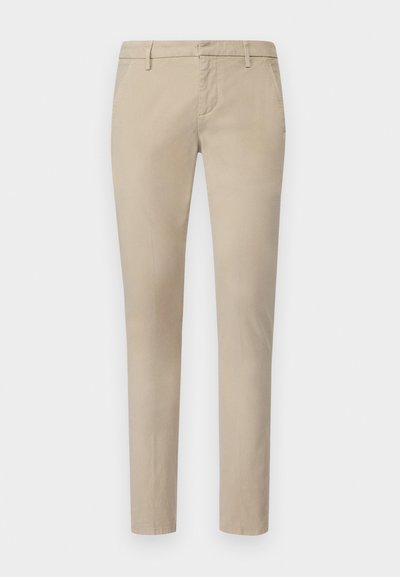 Beige chinos made of cotton. Slim fit design with a straight leg, featuring belt loops and a smooth texture. No visible patterns or accents.