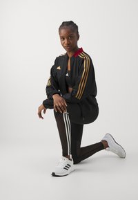 adidas Sportswear TIRO CUT 3-STRIPES TRACK - Jaka ar rāvējslēdzēju - black/team victory red