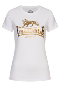 White cotton t-shirt featuring a gold foil print of a lion and "Lonsdale London" text in a bold, serif font. Short sleeves, crew neck.