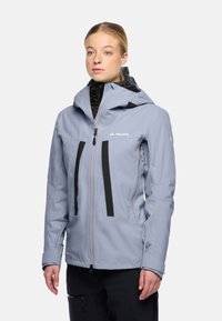 Light gray waterproof jacket with a hood, black accents, two front zip pockets, and contrasting zippers. Features a smooth texture and ergonomic design.