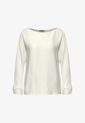 Witte langmouwtop met een gestructureerde oppervlakte, brede halslijn en geribde manchetten. Eenvoudig, los ontwerp zonder extra patronen of versieringen.
