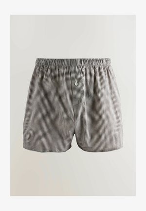 Pilki languoti boxeriai su elastiniu juosmeniu, turintys priekinį mygtuko uždarymą. Medžiaga turi lygią tekstūrą ir mažus baltus raštus.