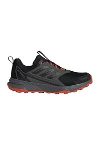 Schwarzer und grauer Adidas Terrex Trailrunningschuh mit orangefarbener Sohle, Schnürsenkeln und atmungsaktivem Mesh-Obermaterial, seitlicher Zuglasche.