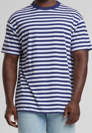 Gestreiftes T-Shirt mit kurzen Ärmeln, mit horizontalen marineblauen und weißen Streifen. Weicher Baumwollstoff, Rundhalsausschnitt, lockere Passform.