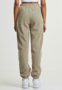 Urban Classics Pantalon de survêtement - unionbeige