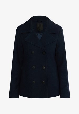 Námořnický dvouřadý kabát vyrobený z texturované látky, s velkými černými knoflíky, klopovým límcem a bočními kapsami.