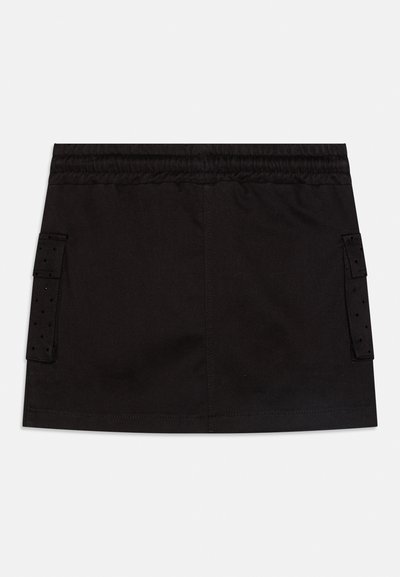 Black mini skirt with elastic waistband and two side pockets featuring perforated flaps, displayed flat on a white background.