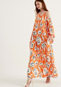 Herita Maxikjoler - orange