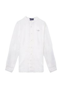 Camicia bianca a maniche lunghe in lino con colletto alla francese, chiusura frontale a bottoni e logo ricamato sul lato sinistro del petto. Tessuto morbido e texturizzato.