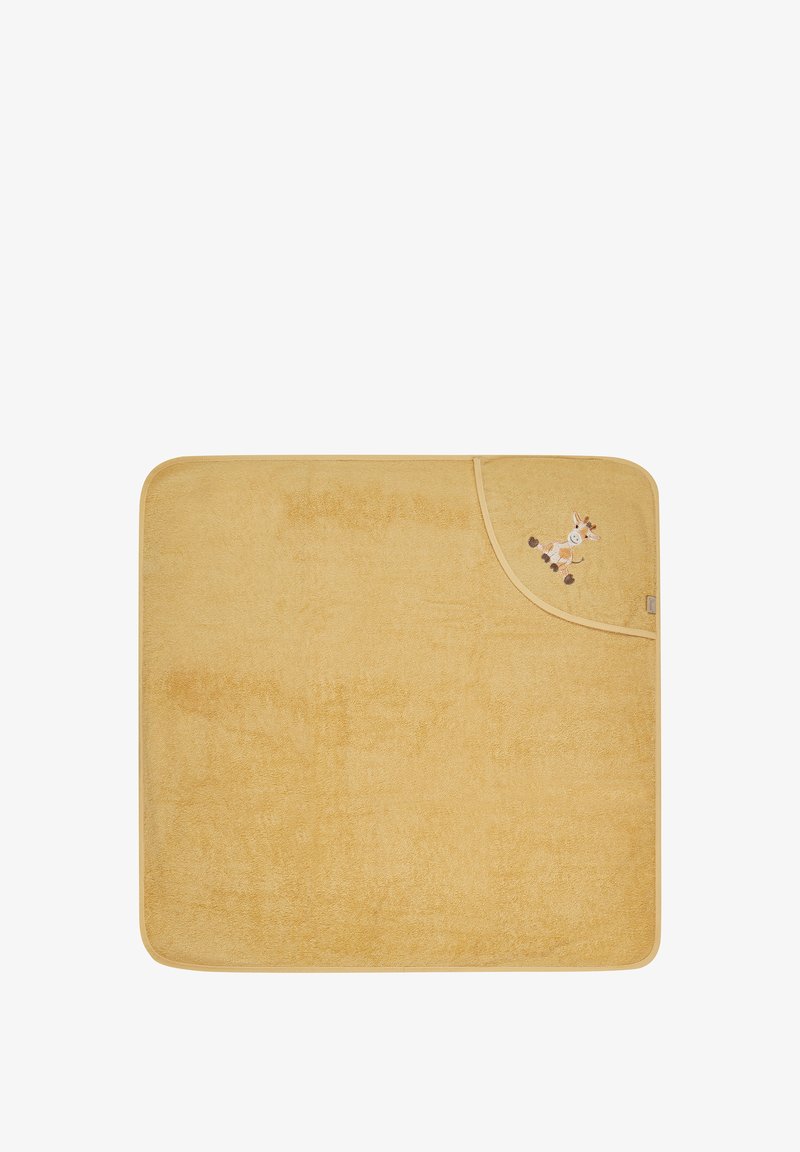 Cotton bath mat, rectangular shape, soft yellow texture, with a curved edge and embroidered giraffe detail on the corner.