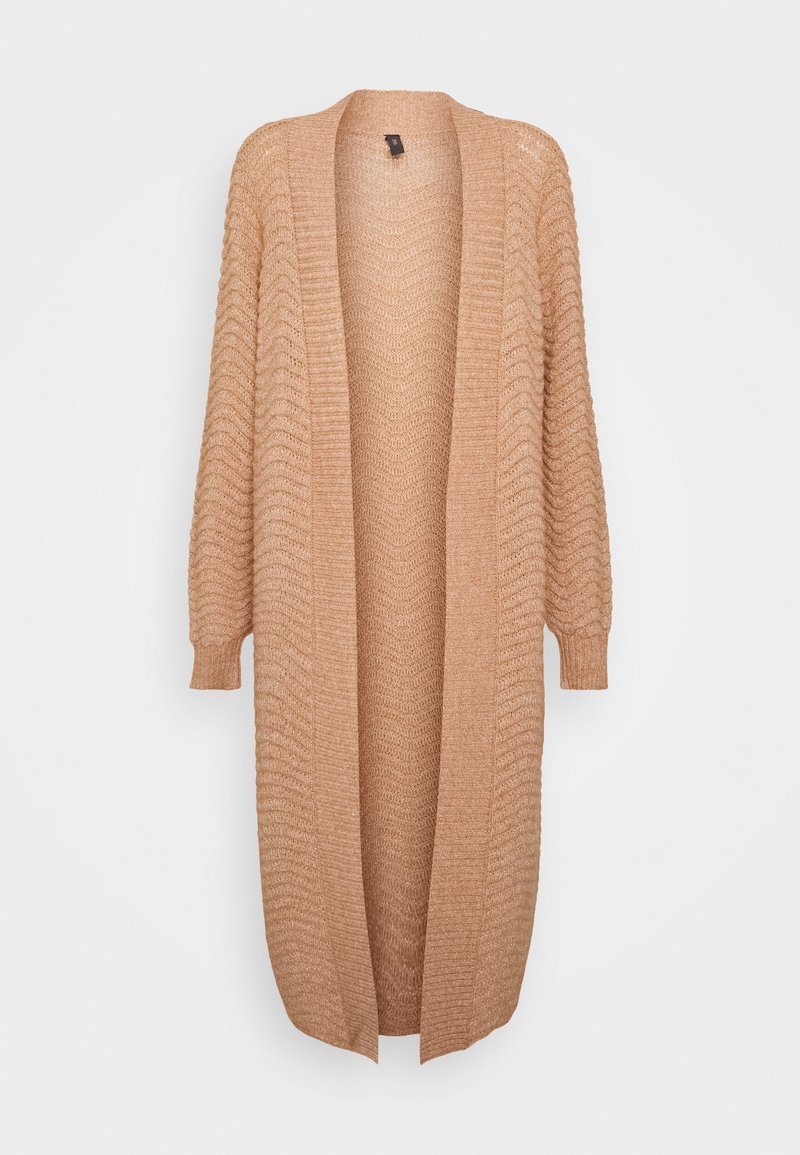 Ljusbrun stickad cardigan med ribbad textur, öppen front och långa ärmar. Har en avslappnad passform och subtil vågmönster.