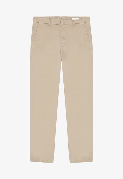 Beige chinos valmistettu puuvillasta, jossa on sileä pinta. Takana kaksi etutaskua ja vetskari. Suora lahkeensuu, ei kuvioita tai koristeita.