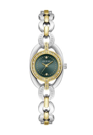 Γυναικείο ρολόι Guess με χρυσούς και ασημένιους κρίκους αλυσίδας, πράσινο καντράν, κρύσταλλα γύρω από το μπ bezel και το λογότυπο Guess στο καντράν και τους κρίκους.