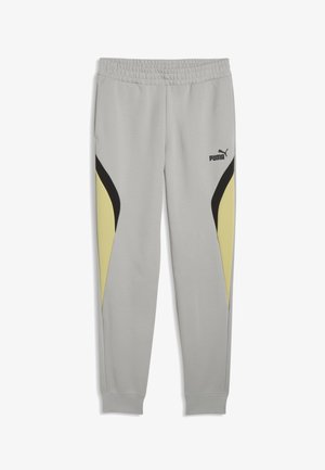 Jasnoszare spodnie dresowe z elastycznym paskiem, czarnymi i żółtymi panelami bocznymi oraz logo Puma na górnej lewej części uda.