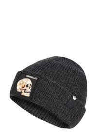 Black knitted beanie with a folded cuff, featuring a rectangular patch displaying a skull and the word "CANCELLED".