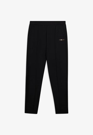 Pantaloni della tuta neri realizzati in tessuto morbido, con due tasche anteriori, un taglio slim e il logo dorato "FREDDY" sulla coscia sinistra.