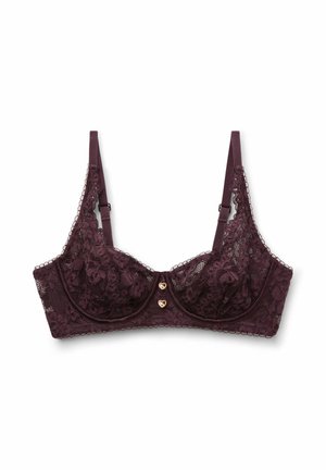 Soutien-gorge en dentelle bordeaux avec motif floral, présentant deux accents dorés en forme de cœur au centre et des bretelles ajustables. Design transparent et texturé.