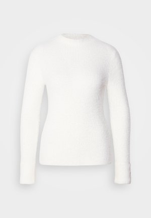 Suéter blanco texturizado con cuello redondo, mangas largas, tejido suave y detalles acanalados. Diseño ajustado con un acabado suave.