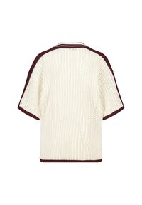 Knit sweater in cream with burgundy accents. Short sleeves, open knit texture, ribbed cuffs, and hem. Casual, boxy design.