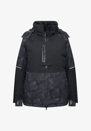 Giacca nera con colletto interno in pile morbido, dotata di una grande tasca sul petto con zip e modelli astratti di linee grigie nella parte inferiore.