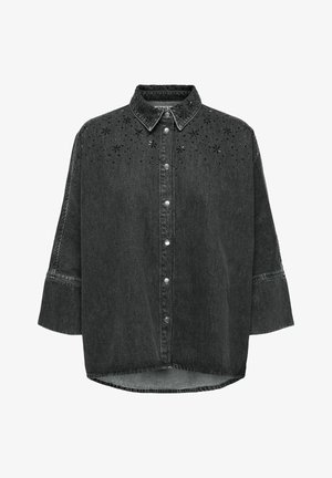 Sort denimskjorte med knaplukning foran, spids krave, trekvartærmer og blomsterudskæringer pyntet med perler.